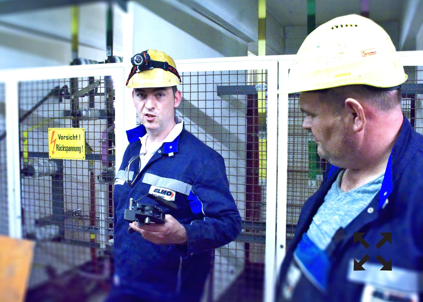 Abbildung: Foto ELMO GROUP Mitarbeiter Pierre Mohr und Diether Posniak im Gespräch auf Kundenbaustelle